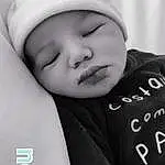 Photograph, Blanc, Neck, Sleeve, Comfort, Happy, Baby, Cool, Bambin, Font, Beauty, Baby & Toddler Clothing, Noir & Blanc, Cap, Enfant, Monochrome, Linens, Baby Products, Portrait Photography, Baby Sleeping, Personne, Headwear