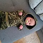 Camouflage, Military Camouflage, Comfort, Headgear, Bambin, Baby & Toddler Clothing, Baby, Pattern, Soldier, Enfant, Car Seat, Military Uniform, Military Person, Military, Linens, Auto Part, Sleep, Army, Fun, Poil, Personne