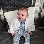 Sourire, Photograph, Jambe, Yeux, Baby & Toddler Clothing, Textile, Flash Photography, Sleeve, Dress, Style, Baby, Happy, T-shirt, People, Bambin, Pattern, Assis, Enfant, Chair, Baby Products, Personne, Joy