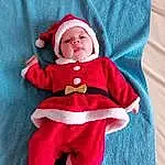 Baby & Toddler Clothing, Textile, Sleeve, Baby, Purple, Rose, Costume Hat, Comfort, Bambin, Magenta, Linens, Lap, Chapi Chapo, Electric Blue, Fictional Character, Noël, Baby Products, Pattern, Christmas Eve, Santa Claus, Personne, Headwear