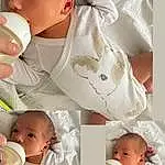 Visage, Joue, Peau, Photograph, Blanc, Baby Bottle, Baby & Toddler Clothing, Baby, Drinkware, Sleeve, Comfort, Gesture, Bambin, Tableware, Enfant, Happy, Baby Sleeping, Collar, Drinking, Personne