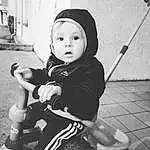 Visage, Photograph, Blanc, Black, Wheel, Tire, Flash Photography, Black-and-white, Style, Baby, Baby Carriage, Cool, Sports Equipment, Baby & Toddler Clothing, Bambin, Noir & Blanc, Plante, Monochrome, Personne, Surprise