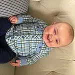 Sourire, Comfort, Couch, Textile, Sleeve, Baby, Bambin, Baby & Toddler Clothing, Linens, Tartan, Plaid, Pattern, Lap, Enfant, Dress Shirt, Assis, Room, Baby Products, Sock, Personne, Joy