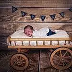 Wheel, Light, Comfort, Infant Bed, Bois, Flash Photography, Tire, Happy, Tints And Shades, Hardwood, Baby, Baby Products, Bench, Vintage Clothing, Assis, Baby Safety, Cart, Leisure, Baby Sleeping, Portrait Photography, Personne