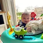 Baby Playing With Toys, Green, Baby, Sourire, Bambin, Happy, Jouets, Herbe, Sharing, Fun, Leisure, Recreation, Enfant, Baby & Toddler Clothing, Plante, Riding Toy, Gadget, Baby Products, Assis, Toy Vehicle, Personne, Joy
