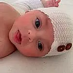 Nez, Joue, Peau, Lip, Chin, Eyebrow, Mouth, Eyelash, Human Body, Baby, Headgear, Bambin, Sleeve, Baby & Toddler Clothing, Close-up, Linens, Baby Products, Comfort, Enfant, Bathing, Personne, Headwear