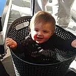 Sourire, Blanc, Comfort, Baby Carriage, Baby, Bambin, Automotive Design, Baby & Toddler Clothing, Baby Products, Chair, Enfant, Assis, Auto Part, Fun, Noir & Blanc, Vehicle Door, Automotive Exterior, Baby Safety, Monochrome, Laundry Basket, Personne