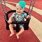 Sourire, Facial Expression, Human Body, Sleeve, Happy, Rose, Baby & Toddler Clothing, Baby, Herbe, Swing, Cool, Bambin, Fun, Enfant, People, Leisure, Aire de jeux, Beauty, Jewellery, Assis, Personne, Joy, Headwear
