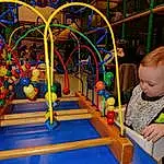 Public Space, Jouets, Leisure, Fun, Recreation, Enfant, Aire de jeux, Bambin, City, Baby, Outdoor Play Equipment, Play, Event, Indoor Games And Sports, Room, Baby Toys, Baby & Toddler Clothing, Symmetry, Personne