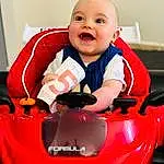 Sourire, Photograph, Blanc, Riding Toy, Vehicle, Happy, Bambin, Baby & Toddler Clothing, Red, Automotive Design, Baby, Fun, Automotive Tire, Vrouumm, Automotive Exterior, Enfant, Thumb, Carmine, Laugh, Personne